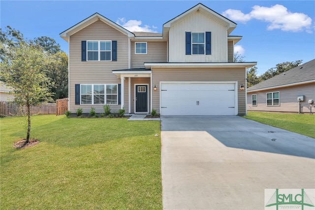 view of front of home featuring a garage and a front lawn