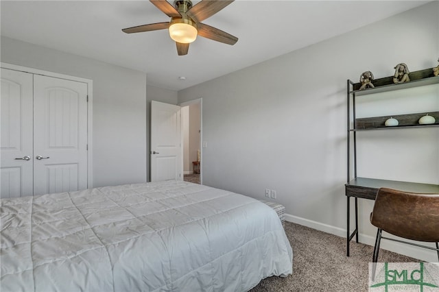 carpeted bedroom with a closet and ceiling fan