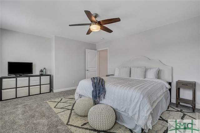 bedroom with ceiling fan and light carpet