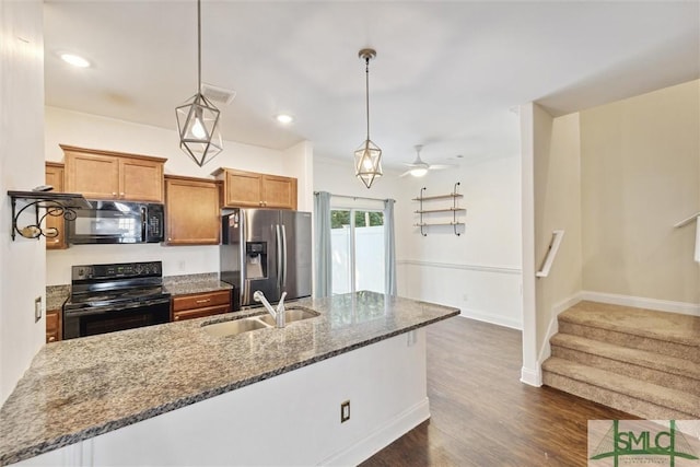 11330 White Bluff Rd Unit 46, Savannah, GA 31419 - kitchen with ceiling fan, dark wood-type flooring, a sink, dark stone countertops, and black appliances