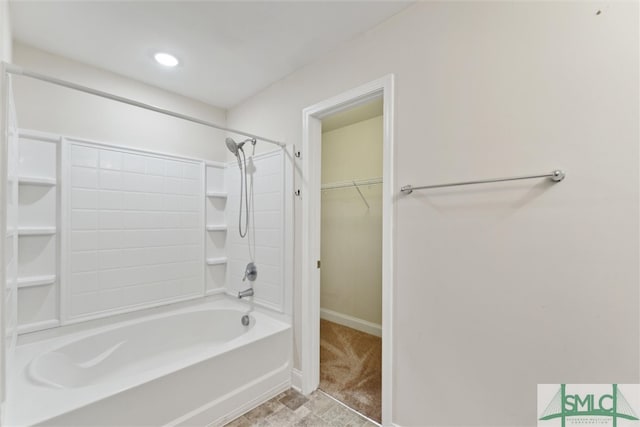 bathroom with bathing tub / shower combination