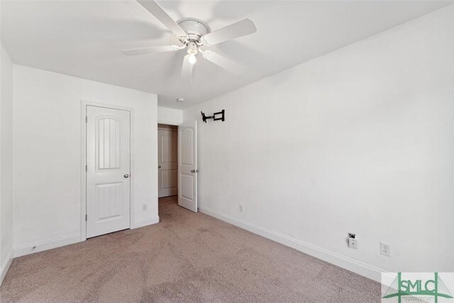 11330 White Bluff Rd Unit 46, Savannah, GA 31419 - unfurnished bedroom with baseboards, ceiling fan, and carpet