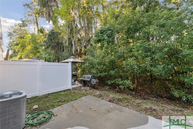 11330 White Bluff Rd Unit 46, Savannah, GA 31419 - view of yard with a patio, central AC unit, and fence