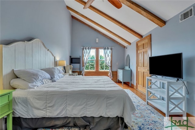 bedroom featuring ceiling fan, beam ceiling, light hardwood / wood-style floors, and high vaulted ceiling