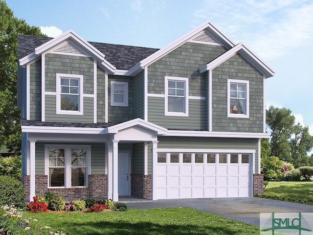 craftsman-style house featuring a garage, brick siding, driveway, and a front lawn