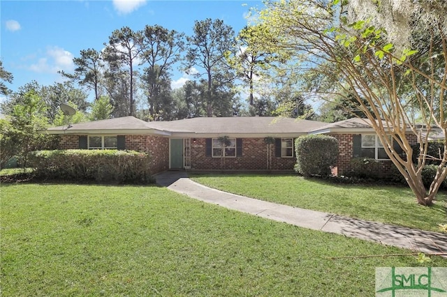 ranch-style house with a front lawn