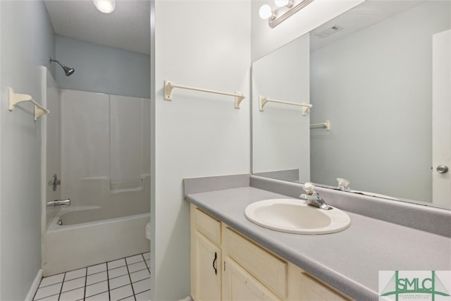 full bathroom featuring vanity, toilet,  shower combination, and tile patterned flooring