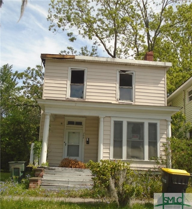 view of front of property featuring covered porch