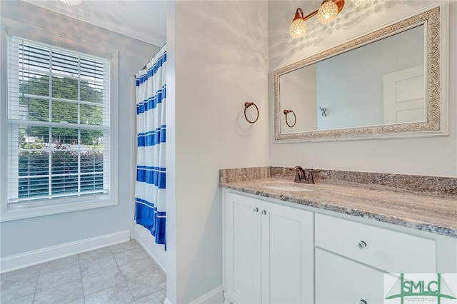 bathroom with vanity, a shower with curtain, and tile patterned floors