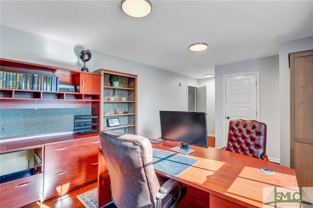 office with wood-type flooring