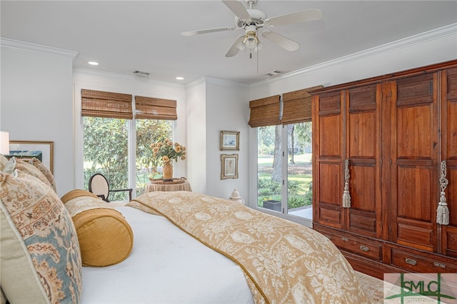 bedroom with hardwood / wood-style floors, ceiling fan, and ornamental molding