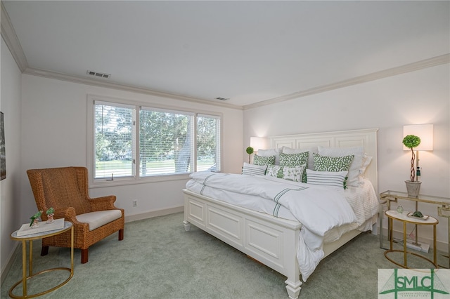 carpeted bedroom with crown molding