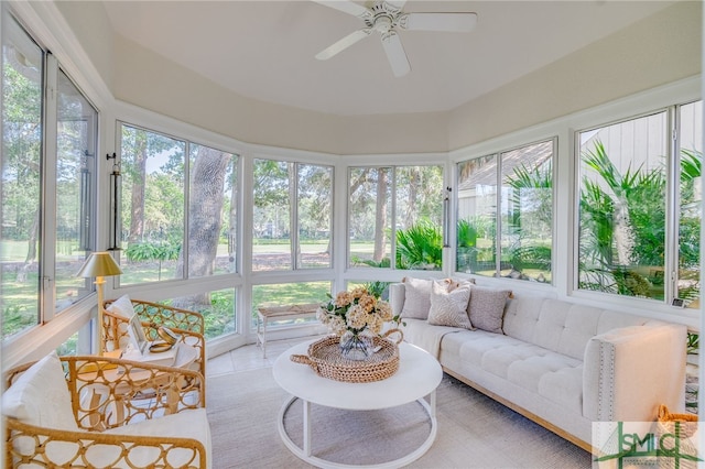 sunroom with ceiling fan and a healthy amount of sunlight