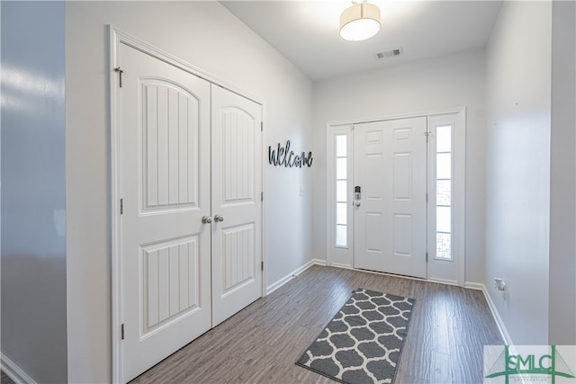 entrance foyer featuring hardwood / wood-style flooring