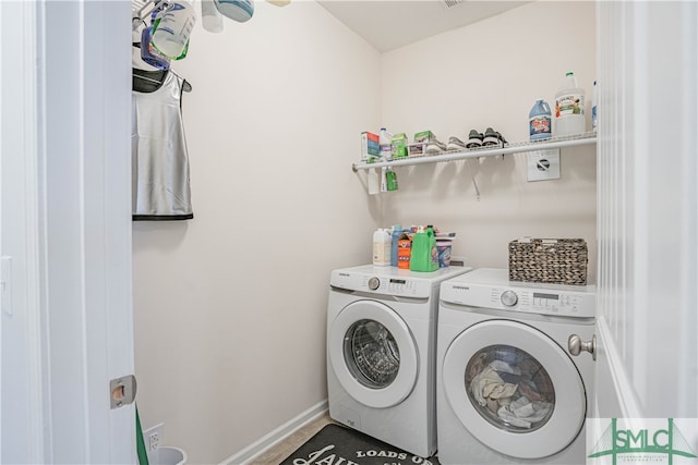 laundry area with washer and clothes dryer