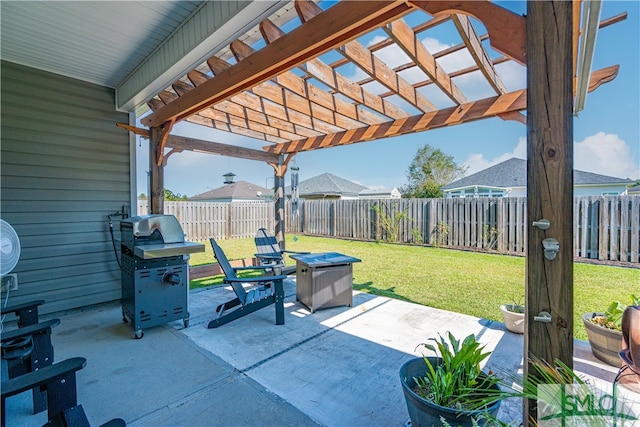 view of patio with grilling area and a pergola