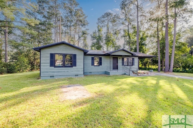 view of front of property with a front lawn