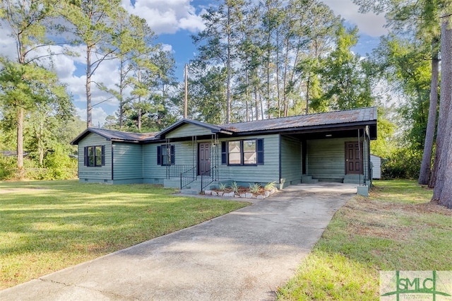 ranch-style home with a front lawn and a carport