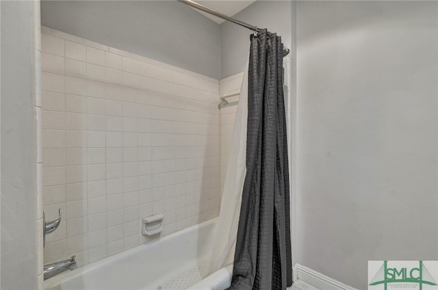 bathroom with shower / bathtub combination with curtain