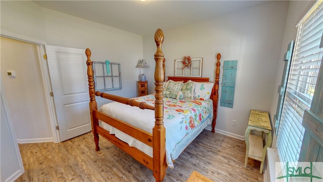 bedroom featuring light wood-type flooring