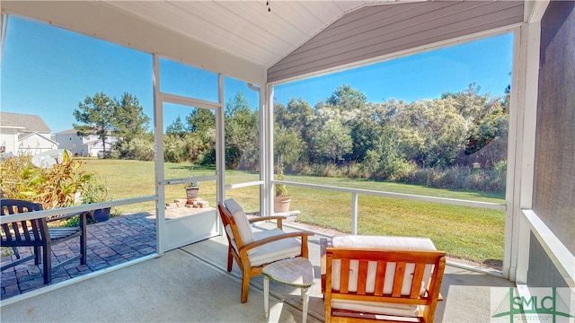 sunroom / solarium with wooden ceiling and vaulted ceiling