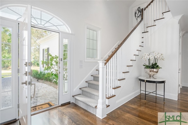 foyer with dark wood-type flooring