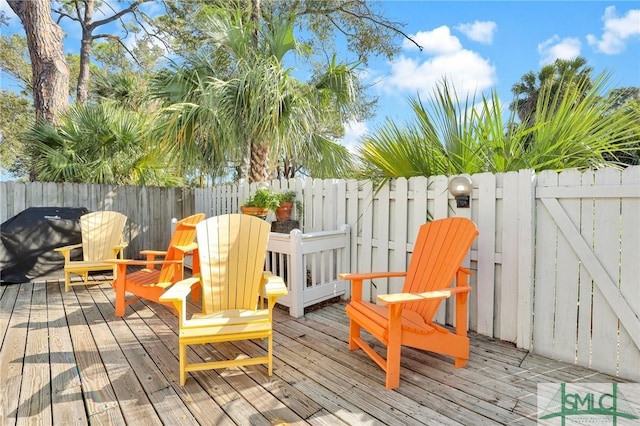 deck featuring a fenced backyard