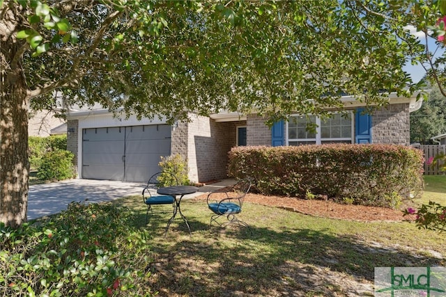 view of property hidden behind natural elements with a front yard and a garage