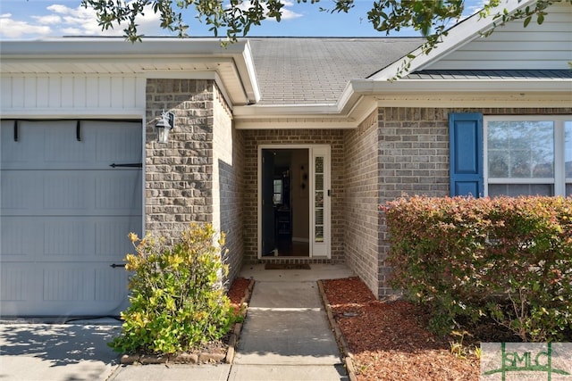 entrance to property with a garage