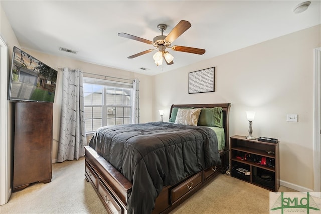 carpeted bedroom with ceiling fan