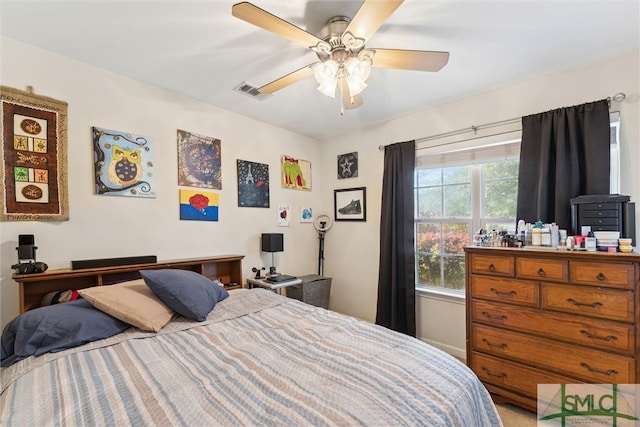 carpeted bedroom featuring ceiling fan