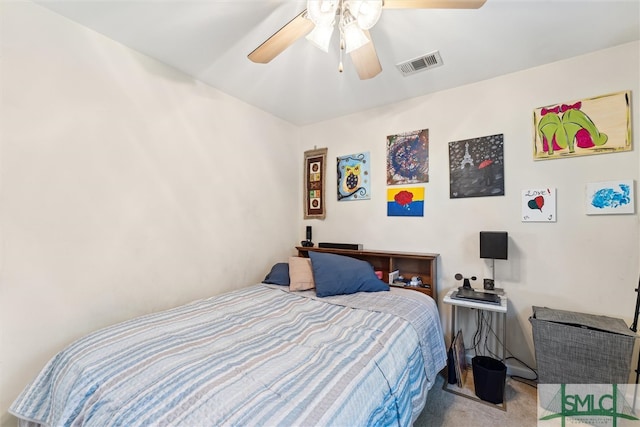 carpeted bedroom with ceiling fan