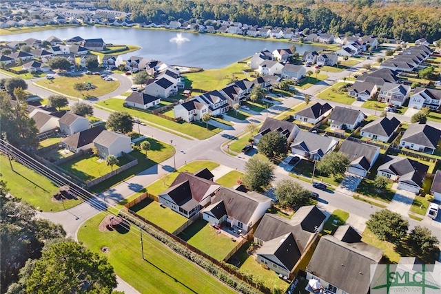 drone / aerial view with a water view