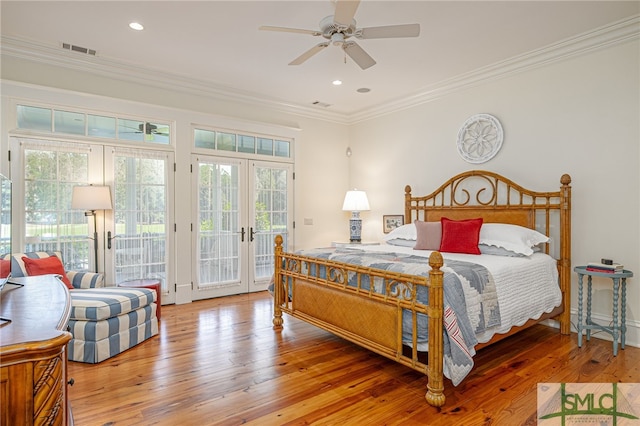 bedroom featuring french doors, access to exterior, wood-type flooring, ornamental molding, and ceiling fan