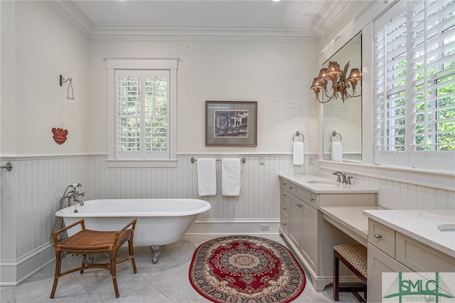 bathroom with vanity, a tub to relax in, tile patterned floors, and ornamental molding