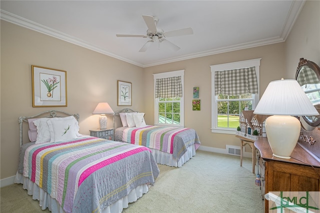 bedroom featuring ceiling fan, carpet flooring, and ornamental molding