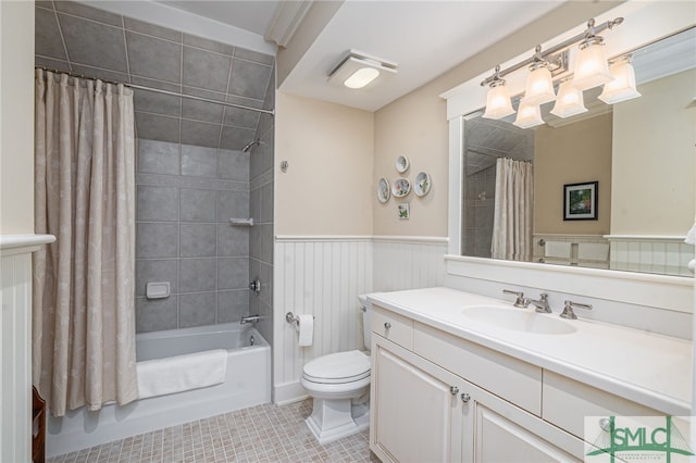 full bathroom with vanity, shower / tub combo with curtain, toilet, and tile patterned flooring