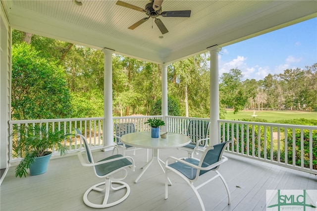 wooden deck with ceiling fan