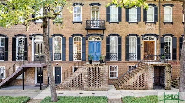 117 W Gaston St, Savannah, GA 31401 - exterior space featuring stairs and brick siding