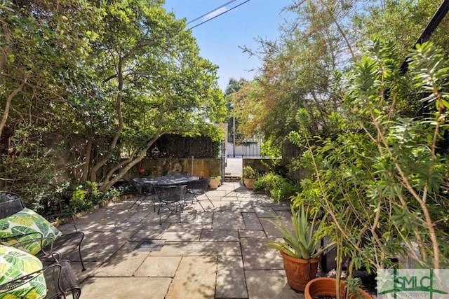 117 W Gaston St, Savannah, GA 31401 - view of patio / terrace featuring fence and outdoor dining space