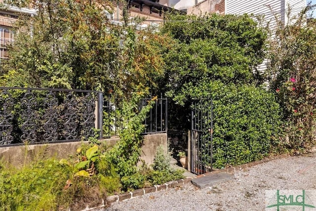 117 W Gaston St, Savannah, GA 31401 - exterior space with fence and a gate