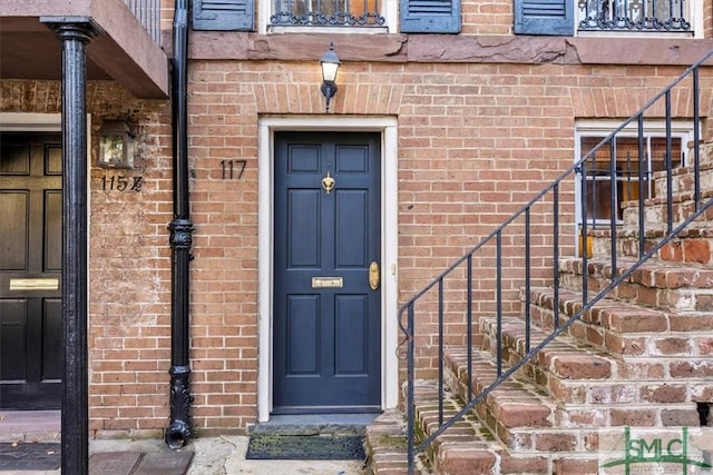 117 W Gaston St, Savannah, GA 31401 - view of exterior entry featuring brick siding
