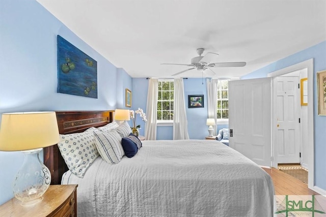 117 W Gaston St, Savannah, GA 31401 - bedroom featuring a ceiling fan, baseboards, and wood finished floors