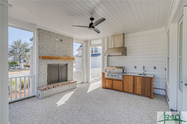 view of patio / terrace with ceiling fan, a grill, sink, and area for grilling