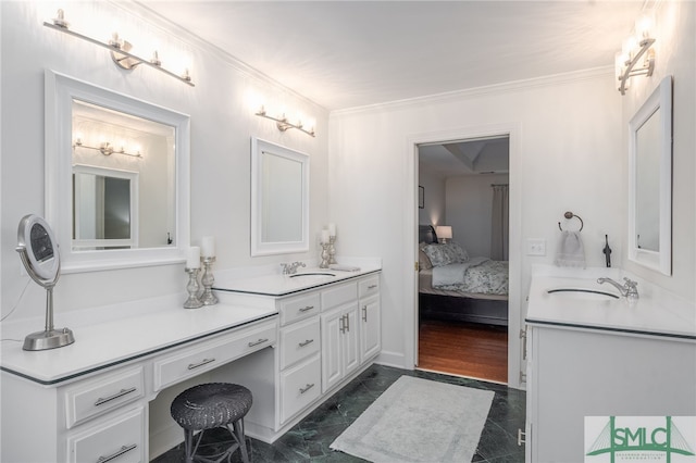 bathroom with vanity and crown molding