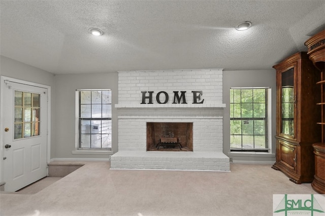 living room featuring a textured ceiling, light colored carpet, and a brick fireplace