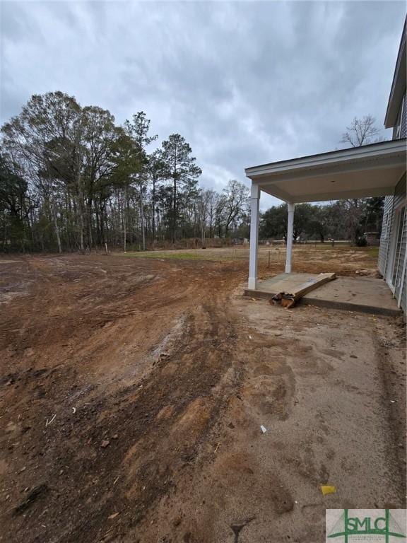 view of yard featuring a carport