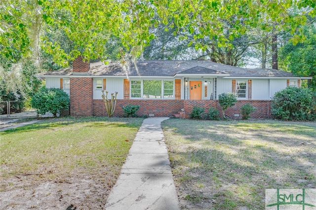 ranch-style home with a front yard