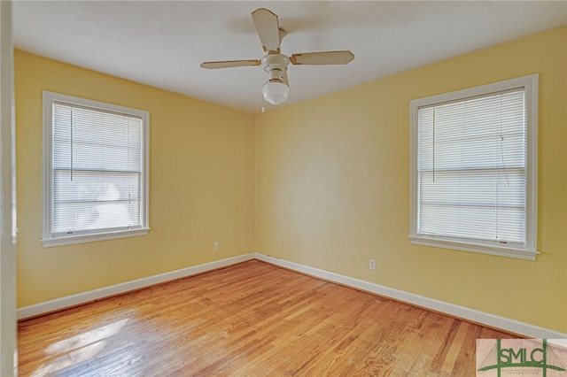 unfurnished room with light hardwood / wood-style floors and ceiling fan