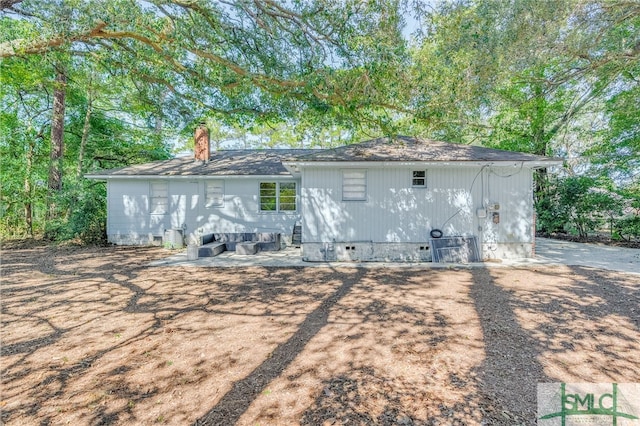 rear view of house featuring a patio area